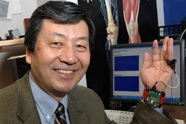 Ford Professor of Engineering Harry Asada models the wearable blood pressure monitor.