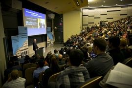 Collins urged the packed audience in Room 10-250 to “reflect on what our role is as scientists and citizens of the world.”