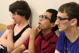 Judging the competition are (from left) MIT alumni Julian Chaidez and Carl Lian, and Patrick Liscio, a junior.