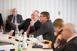 Defense Secretary Ashton Carter (center) met with MIT President Rafael Reif and faculty members.