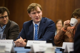 Matthew Davis, president of the Undergraduate Association, speaks during a roundtable discussion Lagarde held with MIT faculty and students.