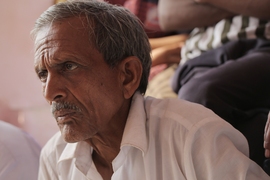 In a rural village outside of Jalgaon, India, a farmer meets with Professor Amos Winter and PhD student Natasha Wright SM ’14 to explain how the cost of kidney stones, which are caused by drinking brackish water and in some situations can cost up to 20,000 rupees per year in medical bills, affect his finances.