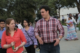 Professor Amos Winter (right) and PhD student Natasha Wright SM ’14 visit Jain Irrigation in Jalgaon, India, to attend the unveiling of the first prototype of their solar-powered electrodialysis desalination device. 