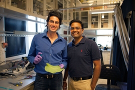 A team of researchers, including graduate student Maher Damak (left) and associate professor of mechanical engineering Kripa K. Varanasi, have found a way to drastically cut down on the amount of pesticide liquid that bounces off plants.
