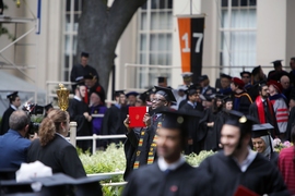 Graduates receive their real diplomas at MIT’s commencement ceremony.