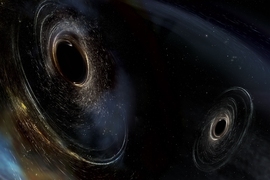 This artist's conception shows two merging black holes similar to those detected by LIGO. The black holes are spinning in a nonaligned fashion, which means they have different orientations relative to the overall orbital motion of the pair. LIGO found hints that at least one black hole in the system called GW170104 was nonaligned with its orbital motion before it merged with its partner.