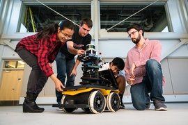 Yu Liang (Gloria) Fang, at left, says NEET’s Autonomous Machines thread appeals to her because it involves hands-on projects. She is joined by Michael Everett, Albert Go, and Mitchell Guillaume.
