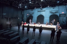 The medieval banquet scene includes a floor-to-ceiling projection of Salzburg Cathedral, which was the site of the original performance of the 1911 play “Jedermann.” 