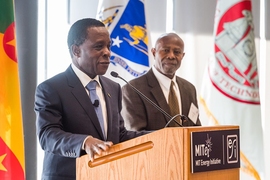 Prime Minister of Grenada Keith Mitchell (left) spoke about how the Caribbean community is coping with the aftermath of the hurricanes. He was introduced by Cardinal Warde, a professor of electrical engineering (right) and longtime friend of the prime minister.
