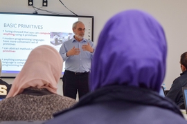 MIT professor of computer science and engineering and chancellor Eric Grimson lectures at one of the introductory sessions of the ReACT certificate program in Amman, Jordan.
