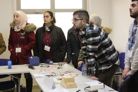 Students listen attentively as their year-long series of classes begins.
