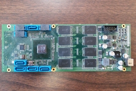 Researchers from MIT’s Computer Science and Artificial Intelligence Laboratory (CSAIL) have designed a device that helps cheap flash storage process massive graphs on a personal computer. The device (pictured here) consists of a flash chip array (eight black chips) and computation “accelerator" (square piece directly to the left of the array). A novel algorithm sorts all access requests for gr...