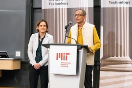 Esther Duflo and Abhijit Banerjee give remarks and answer questions at an MIT press conference on Oct. 14.