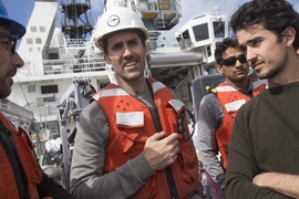 Professor Thomas Peacock (left) with graduate students Rohit Balasaheb Supekar (center) and Carlos Munoz Royo (right) aboard the RV Sally Ride.