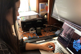 Woman working at a computer