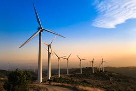 Wind turbines on the top of a hill